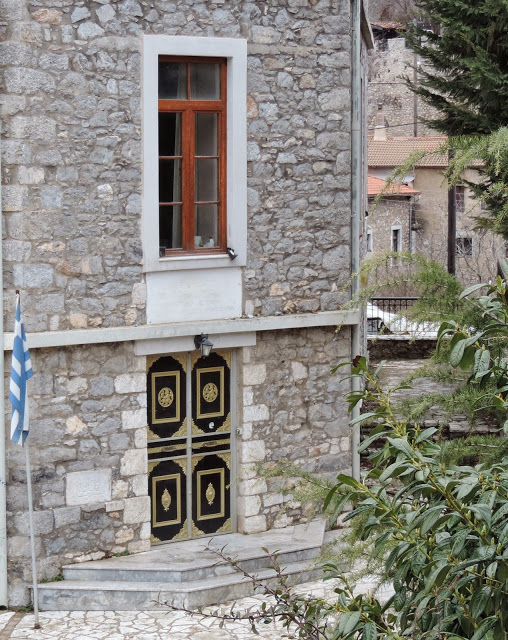 Detail of the entrance door to the school of silversmiths in Stemnitsa