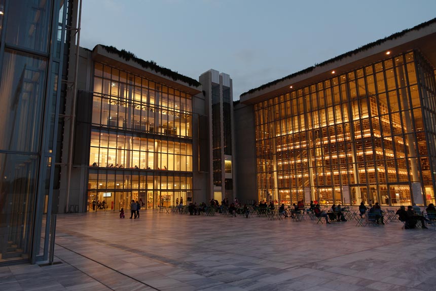 The Agora at the Stavros Niarchos Foundation Culture Center after sunset.