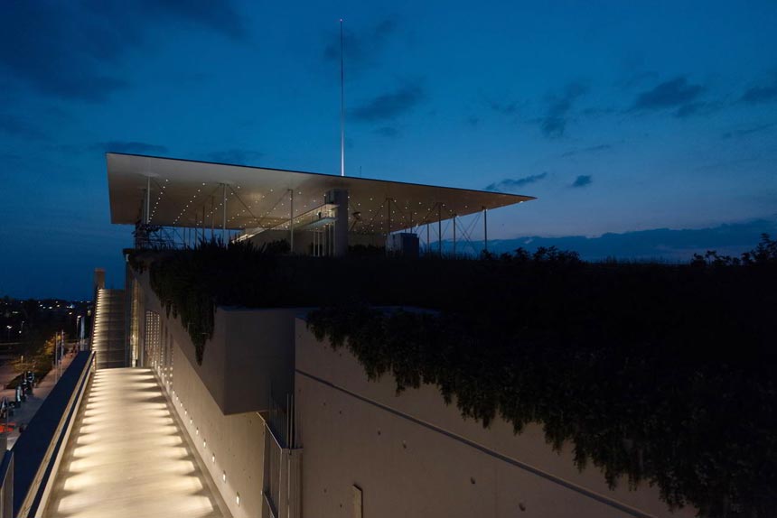 The Stavros Niarchos Foundation Culture Center after sunset.