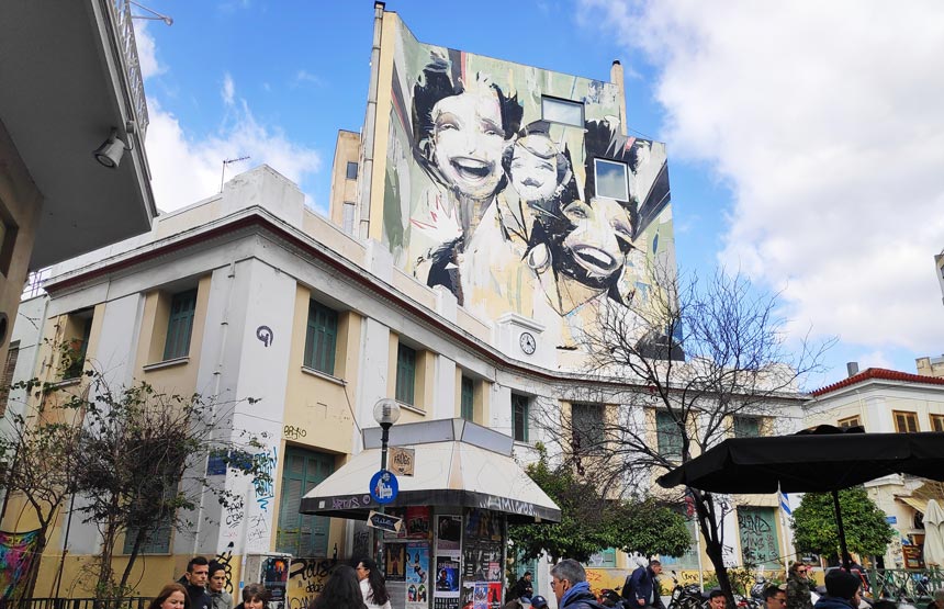 A large wall mural from street art in the square of Psiri downtown Athens.