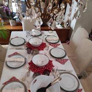 View of a Christmas tablescape from above. Image by Velvet.