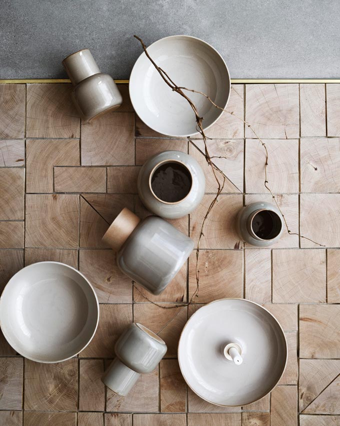 Interior Trends 2017: Ceramic ware on a flatlay designed by Cecilie Manz: the Fritz Hansen Earthenware Jar Vase. Image via Nest.co.uk.