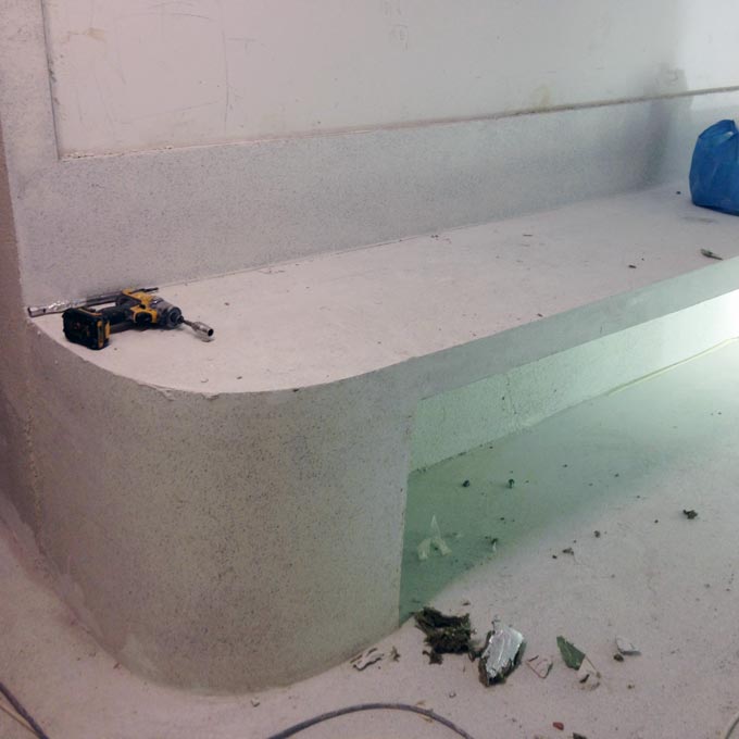 A counter with terrazzo being installed.