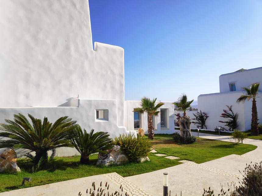 A housing complex of low rise white washed buildings in a typical Cycladic architecture in Paros.