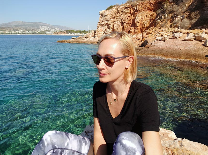 Velvet by the seaside with a rocky beach in the background.