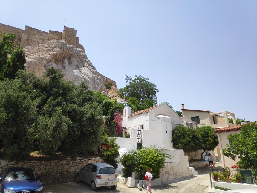 Athens, an ever-changing city. Here are the first houses you encounter behind the hill of the Acropolis as you head for Plaka. Image by Velvet.