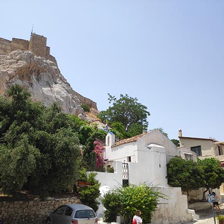 Athens, an ever-changing city. Here are the first houses you encounter behind the hill of the Acropolis as you head for Plaka. Image by Velvet.