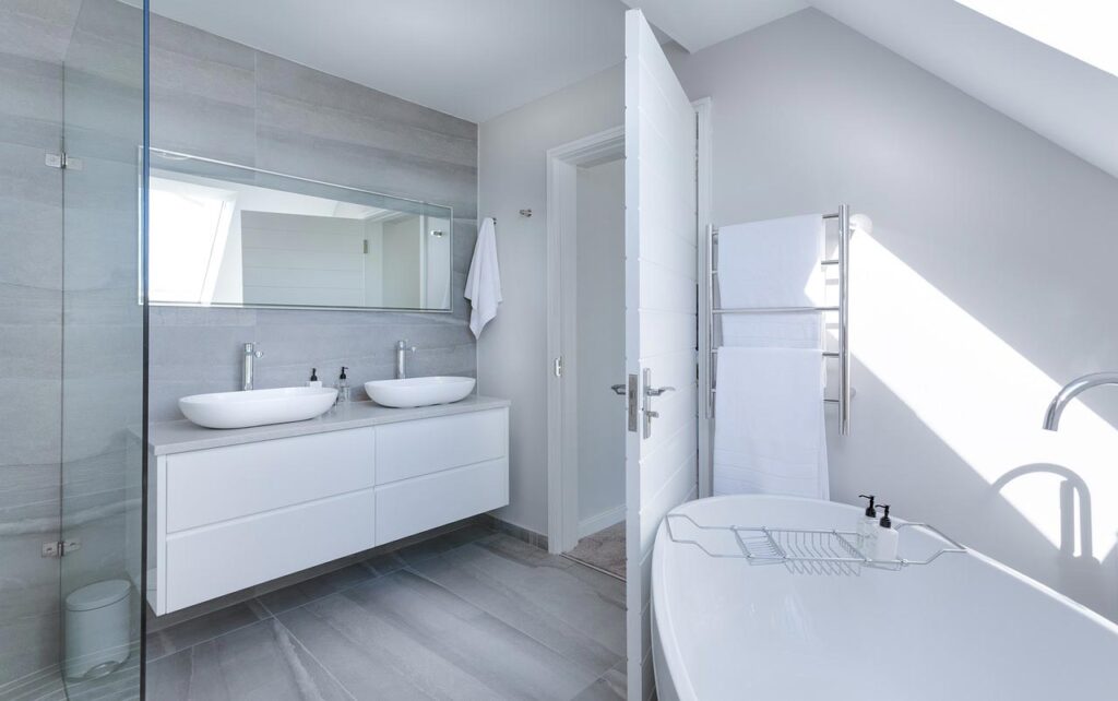 Bathroom improvement ideas: A modern all white minimal bathroom interior.