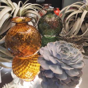 Gorgeous display of Murano glass vases by Venini among plants