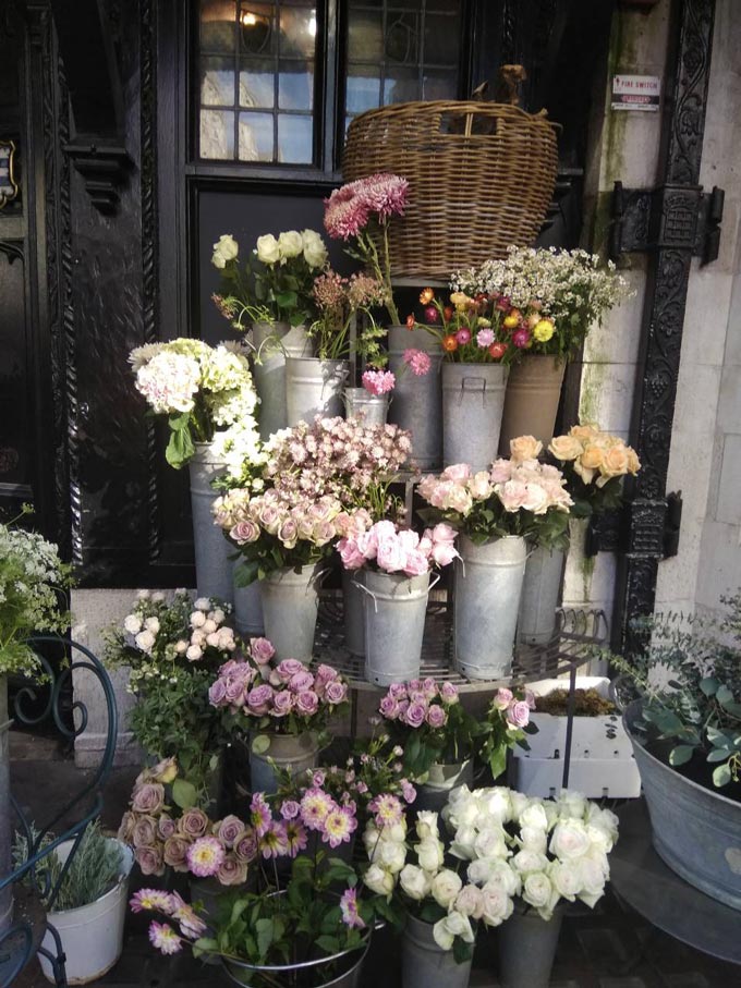 Lots of flower bouquets on sale outside a florist shop in London.