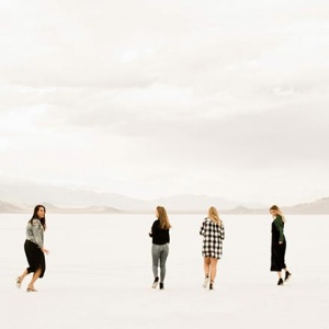 Four women walking in Bonneville Salt Flats