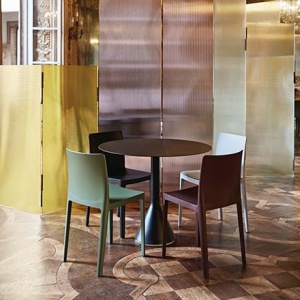 A dining setting with the Hay Elementaire Chair designed by the Bouroullec brothers. Image by Nest.co.uk.
