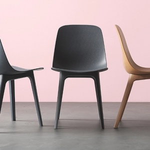 Three Odger chairs from IKEA in different colors.
