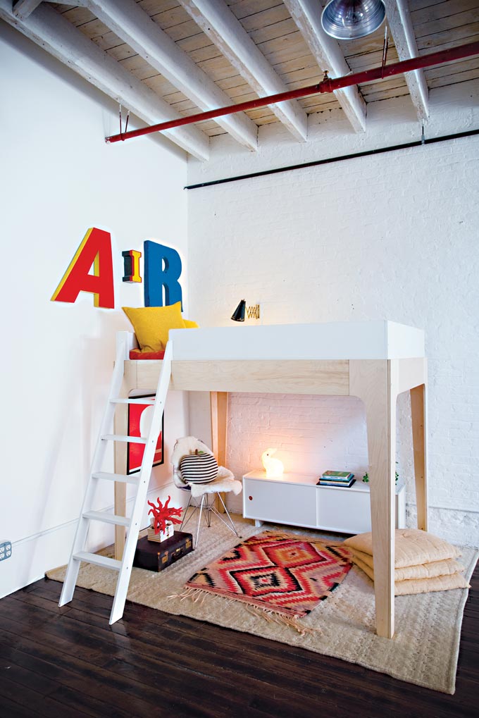 A child's bedroom with a bunk bed and a play area under it. Image by Cuckooland.