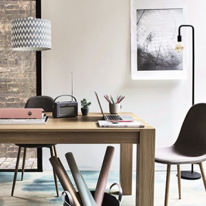A big desk can provide more than one working stations just like in this space. Image by Argos.