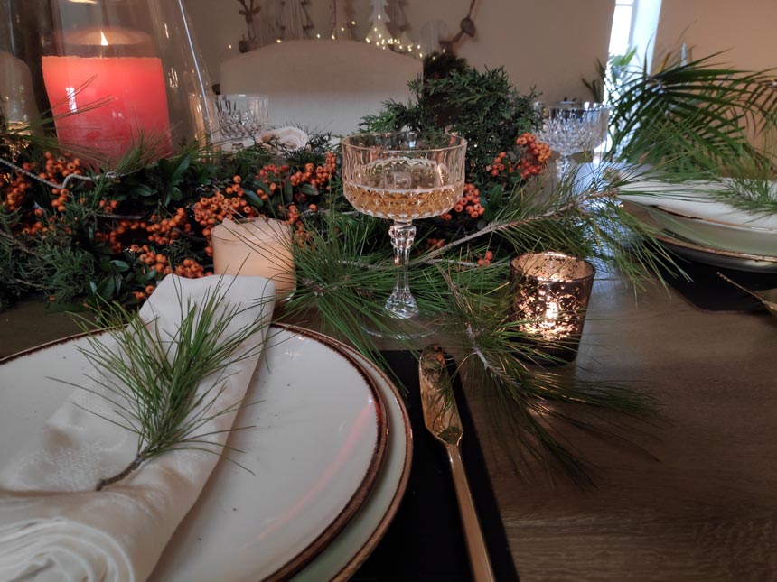 View of three sets from Elisabeth's Christmas tablescape.