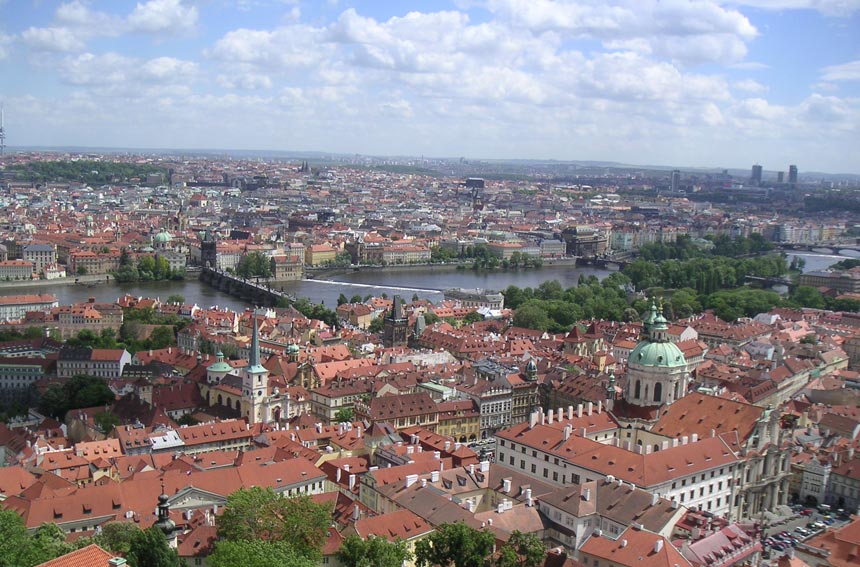 Partial view of Prague with the Vltava river meandering through it.