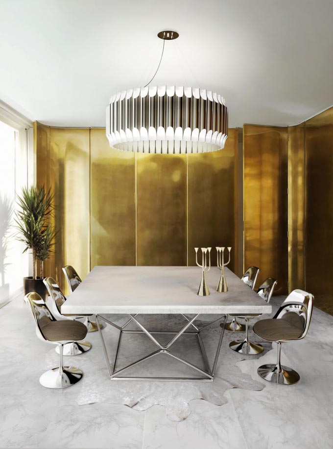 What a glamorous dining room. Gold, white and silver hues fuse together with the help of a gorgeous chandelier. Image by DelightFULL.