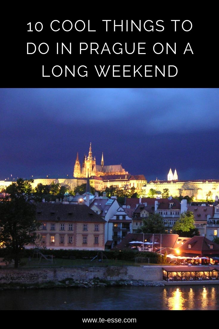 A pin graphic with an image of Prague at night. This is a guide to the city on a long weekend break.