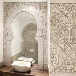 A beautiful vanity room made with handmade beige decorative Moroccan tiling. Image by G. Vega.