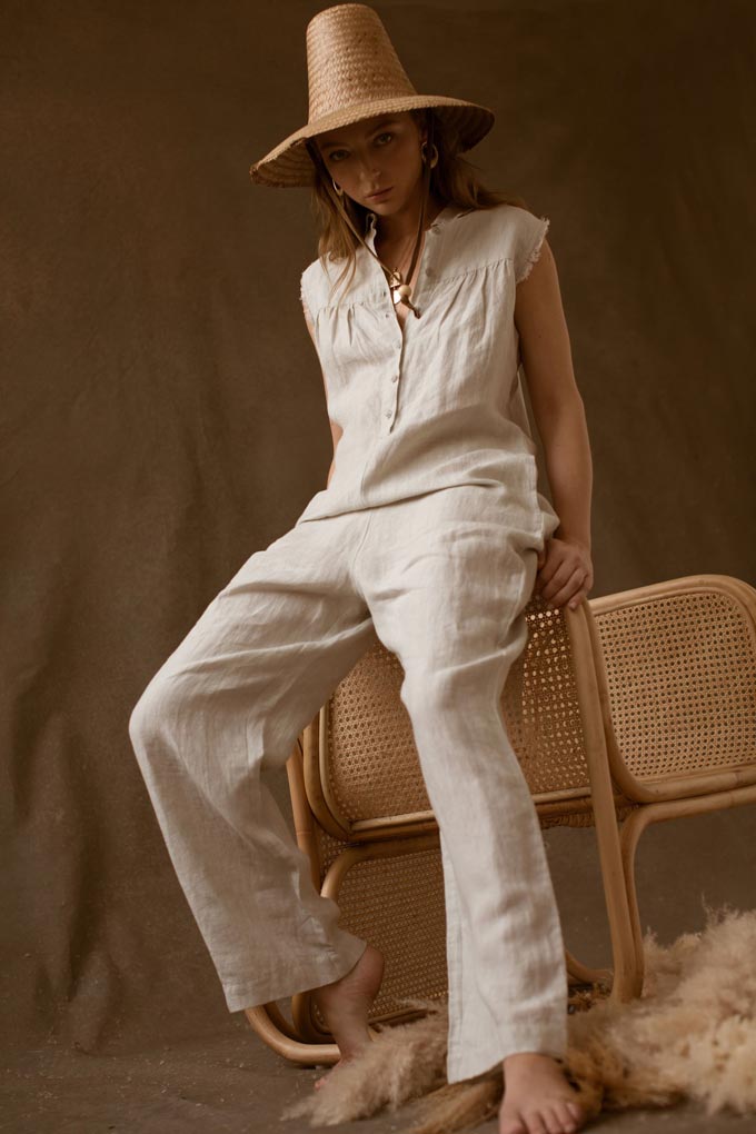 A sleeveless jumpsuit made of linen by Made With Respect.