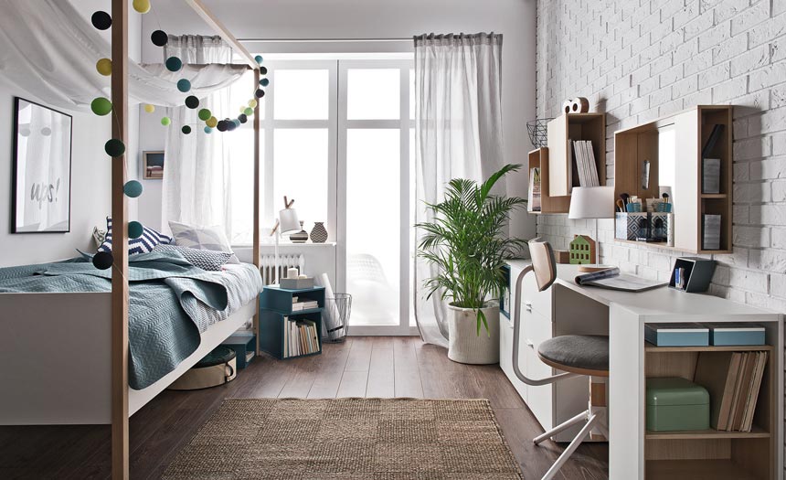 A teen's bedroom with some blue accents but white furniture. Image by Cuckooland.