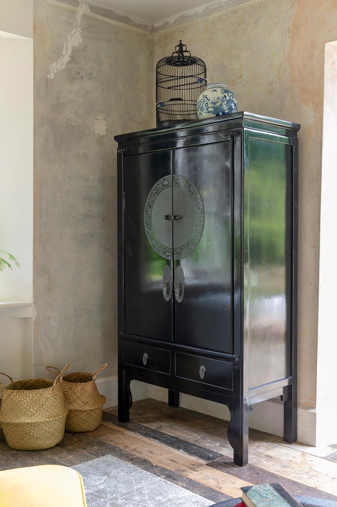 A vignette with a black Chinese wedding cabinet that I think can make a great add on in an mix and match home interior. Image by Orchid Furniture.