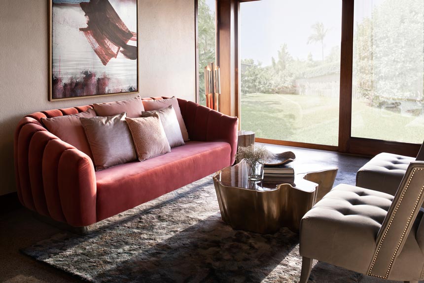 Contemporary living room with organic inspirations with SEQUOIA center table, OREAS bold red sofa, and NAJ grey armchair. Image: Brabbu Design Forces.