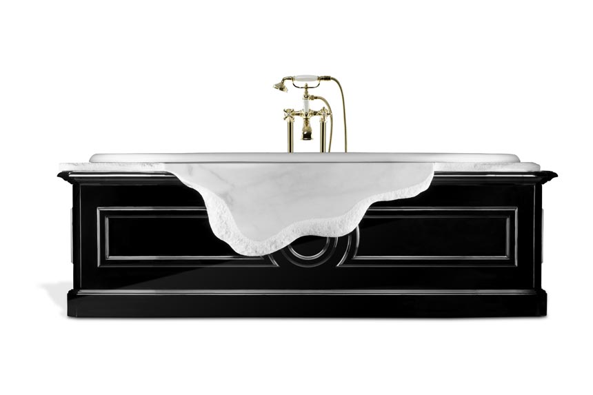 Cutout image of a stunning bathtub that combines Ibiza marble and high gloss black wood. Image by Brabbu Design Forces.