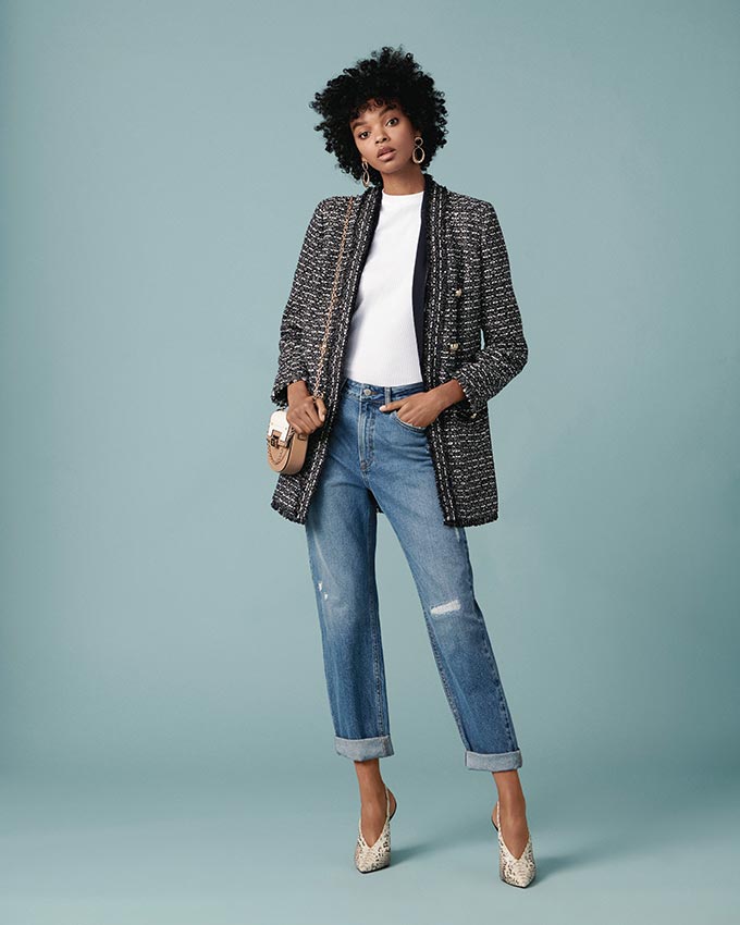 I love the long blazer over those ever-so-slightly distressed jeans, paired with a white crew neck tee and some pointy heels. Image by River Island.