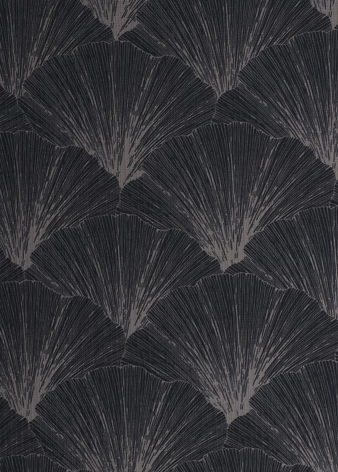 A fan like print on a black background of a wallpaper. Image by Rug'Society.