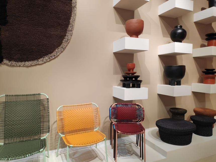 Chairs, stoneware and a rug on display from Ames at iSaloni 2019 in Milan.