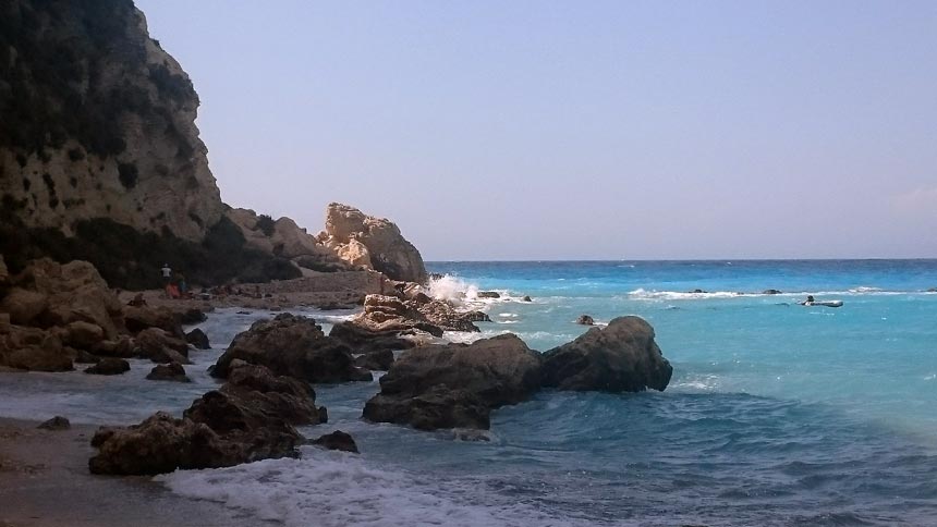 The rocky edge of Agios Nikitas beach in Lefkada Greece. Image by Velvet Karatzas.