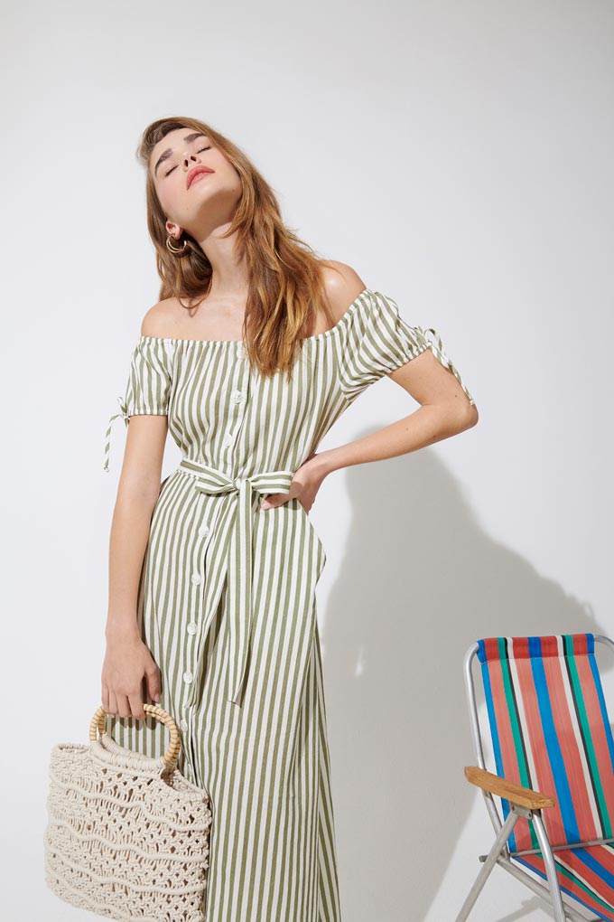 A Bardot summer dress with white and green stripes. So summery especially when paired with a knit bag. Image by Miss Selfridge.