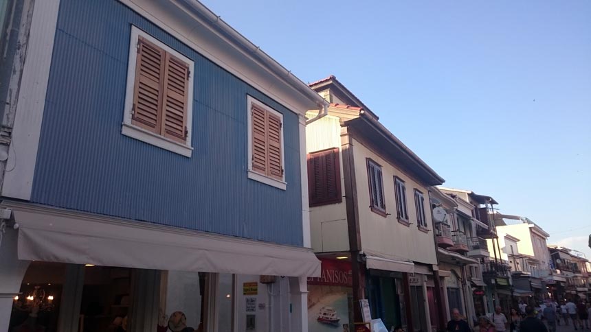 Traditional local exterior facades of homes in Lefkas town, Greece.