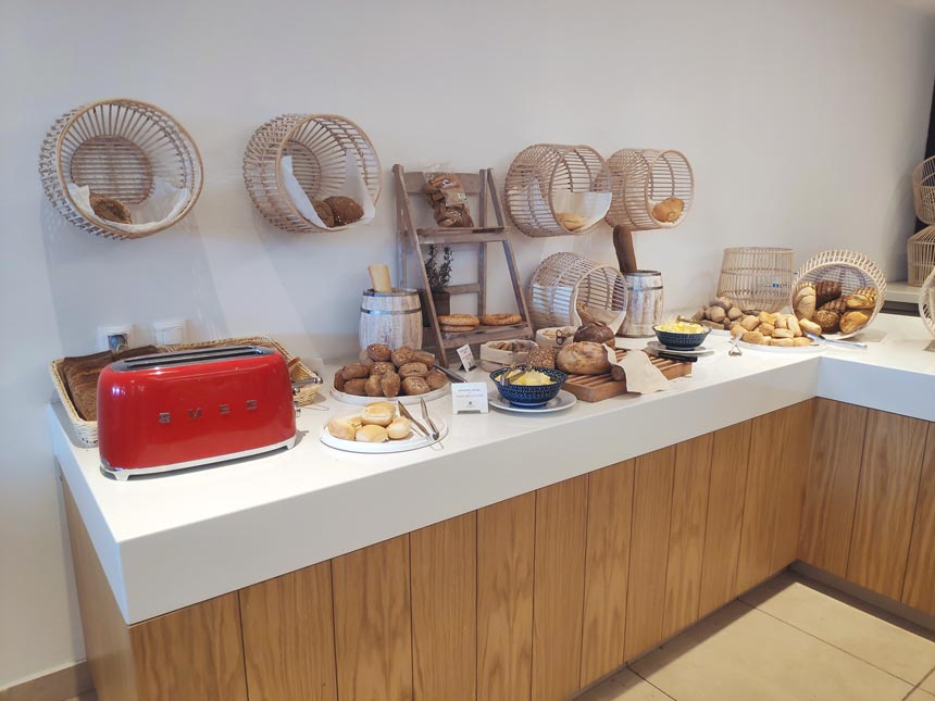 The breakfast bread buffet section at Grecotel Lux Me Rhodos.