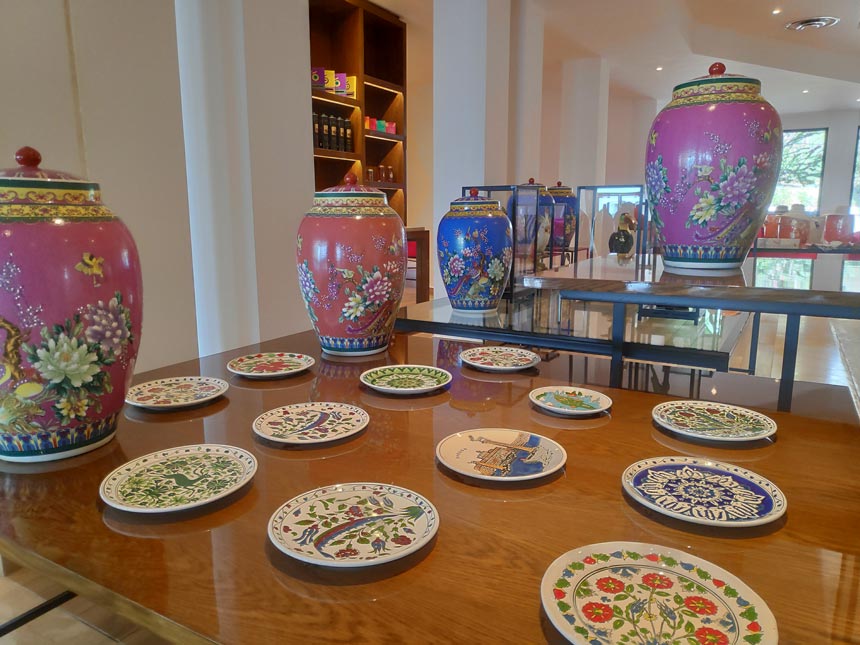 View of different styled ceramic pottery on display at Grecotel Lux Me Rhodos lobby.