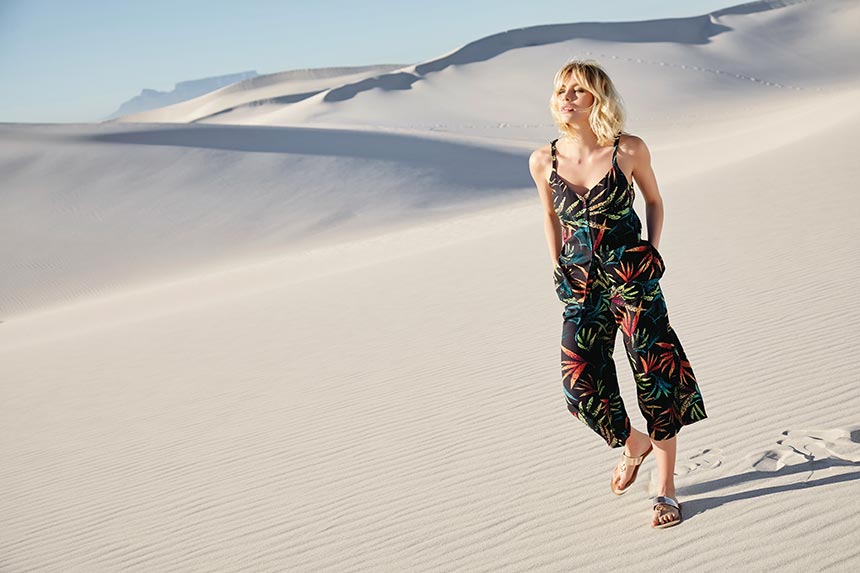 A tropical print jumpsuit is ideal for a hot summer weather outing. Image by M&Co.