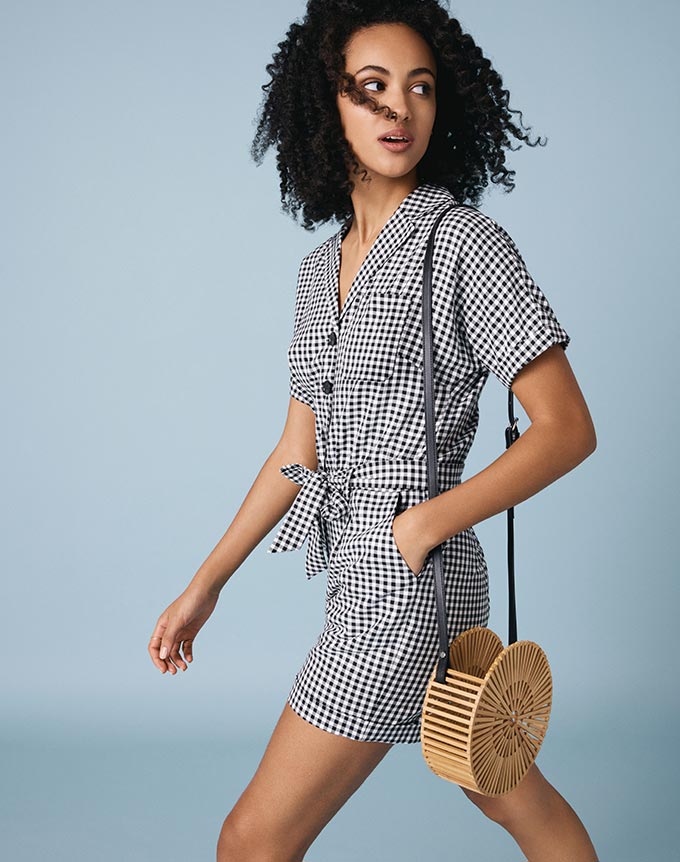 A gingham pattern playsuit like this will not go un-noticed! Image by Oasis.