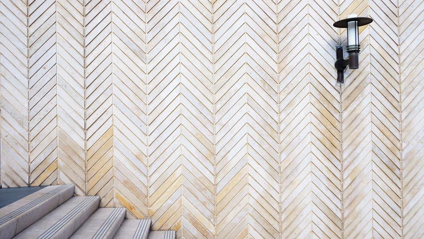 A chevron pattern tiled wall.