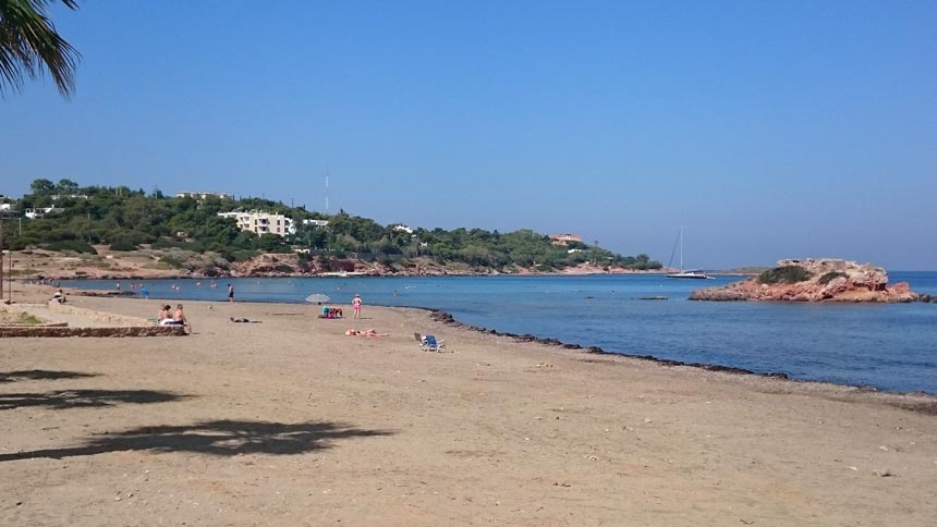 View of a sandy beach in Kavouri, Vouliagmeni. Image by Velvet.