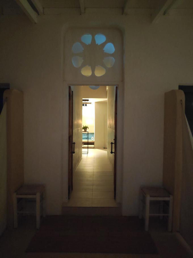 Looking into the reception area through the main entrance on a late evening.