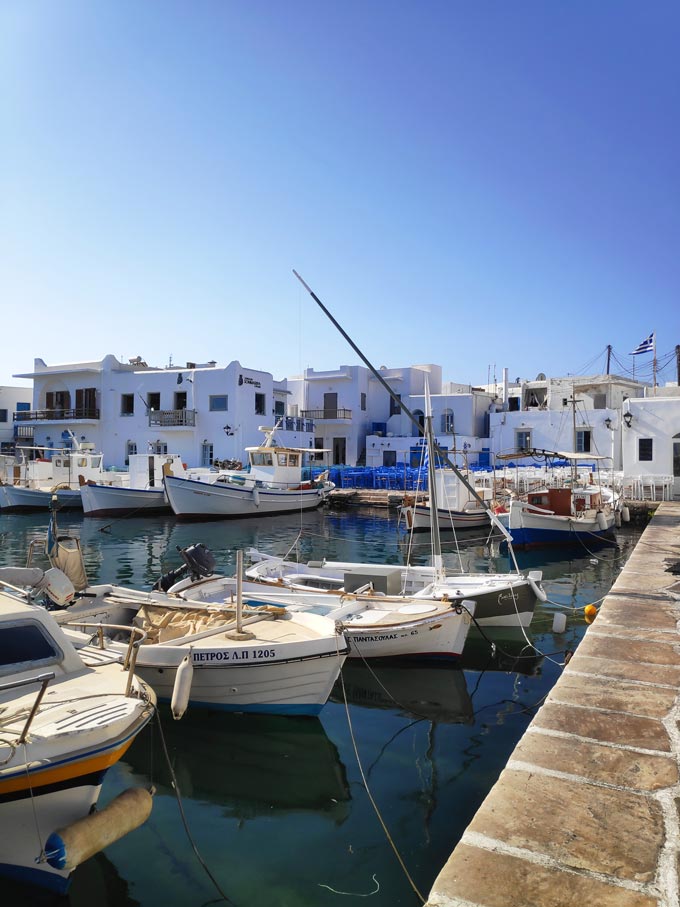 Fishing boats docked at Naoussa's port in Paros.