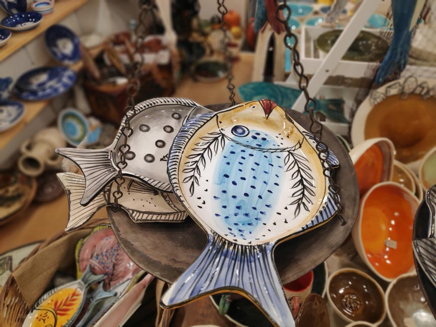 Detail of a ceramic food platter designed and hand painted as a fish from Maria Banou.