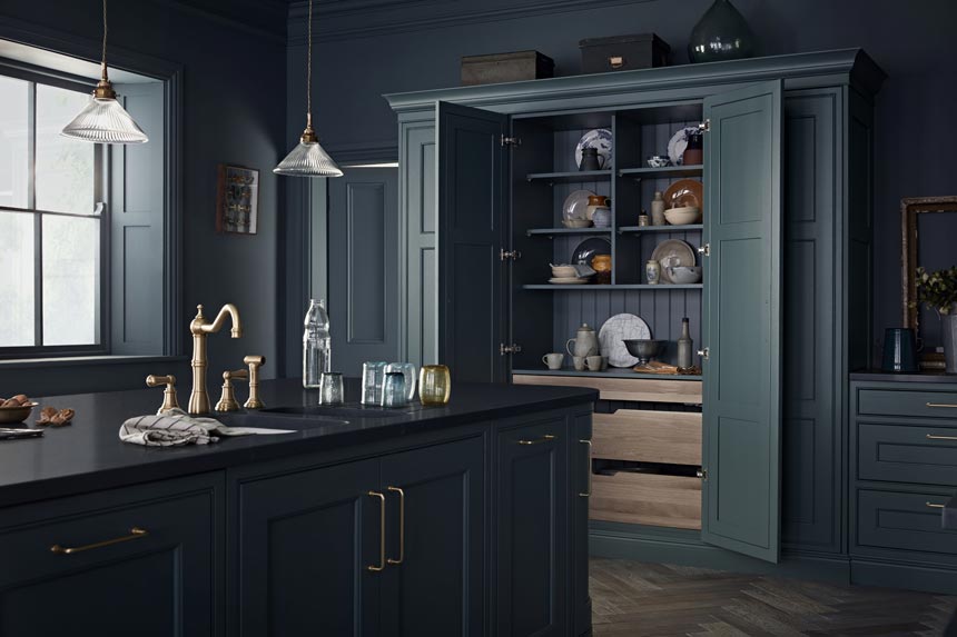 A moody dark blue green kitchen that has gotten my heart skipping. Image via Kitchenmakers.