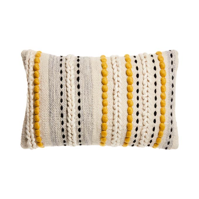 A cut image of a boho inspired decorative cushion. Image by Adairs.