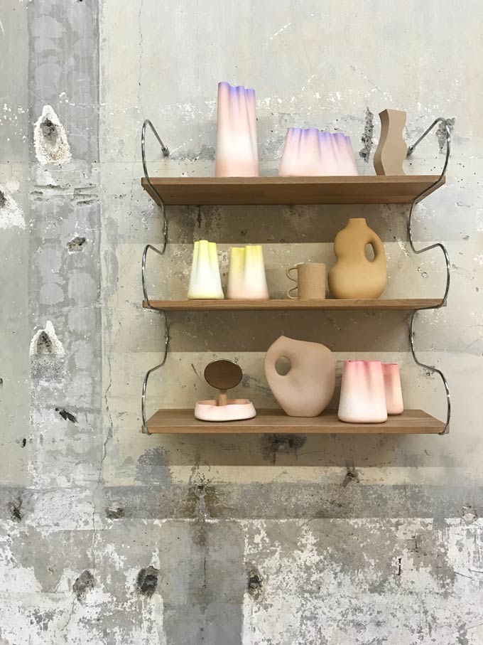 Decor on shelves. Detail view from Elle Decoration Fluid Forces installation during the 2019 Dutch Design Week.