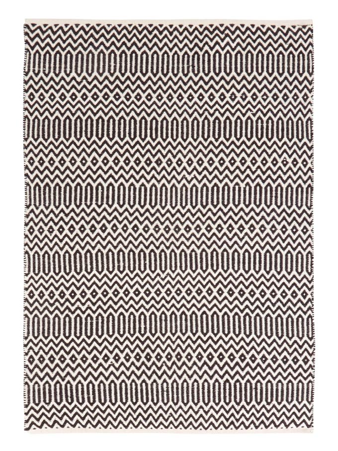 A black pattern boho inspired rug. Image by Very.co.uk.