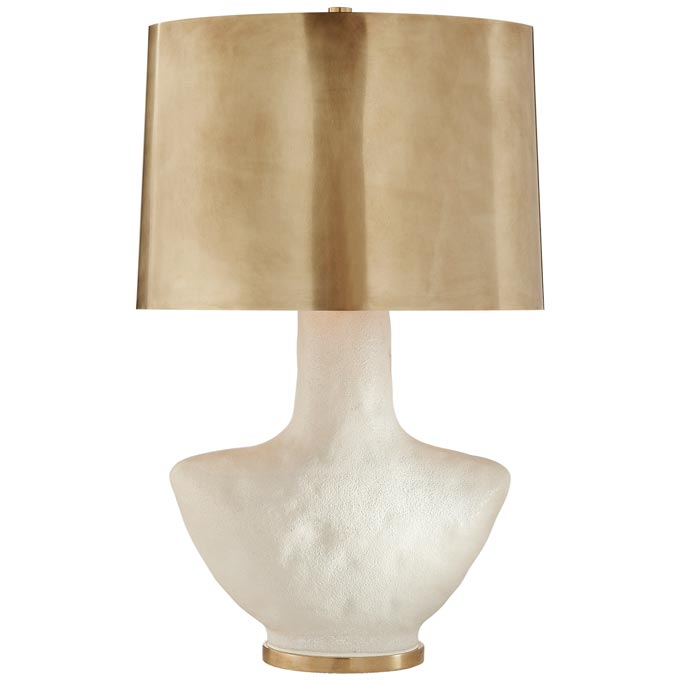 A gorgeous table lamp that goes by the name Armato, with a porous white ceramic with oval antique-burnished brass shade by Kelly Wearstler. Image via The Montauk Lighting Co.