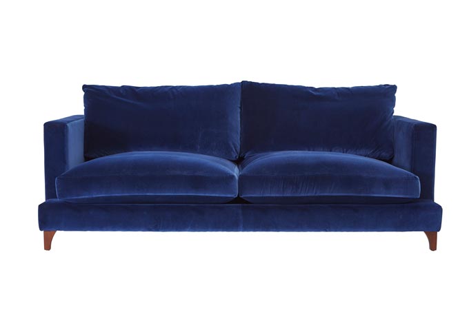 A blue velvet sofa. Image: Darlings of Chelsea.